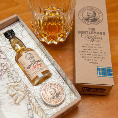 Cire à moustaches The Gentleman's Stiffener Captain Fawcett et bouteille de whisky